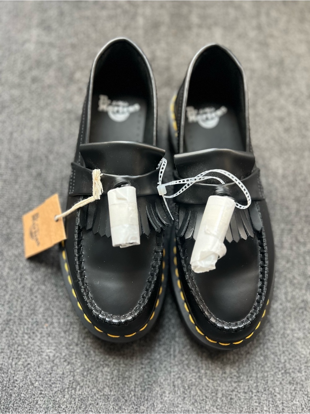 Dr. Martens Black Leather Kiltie Tassel Loafers with Yellow Stitching